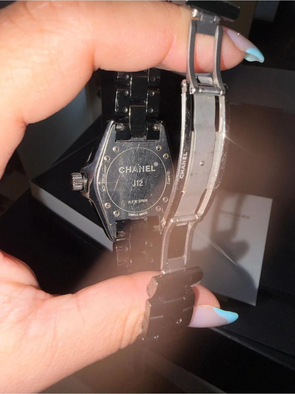 CHANEL Black Ceramic Ladies Watch with Silver Accents